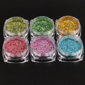 Macro detail of six-color laser nail glitter powder set in clear jars on black background