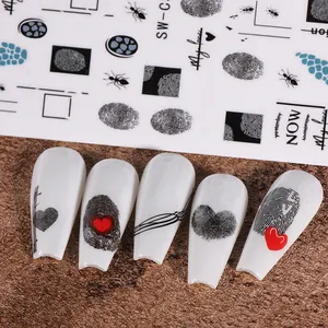 Detail of 3D fingerprint heart nail stickers with love motifs on long white coffin nails