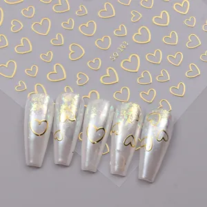 3D metallic gold heart nail art stickers featuring irregular minimalist hollow line designs