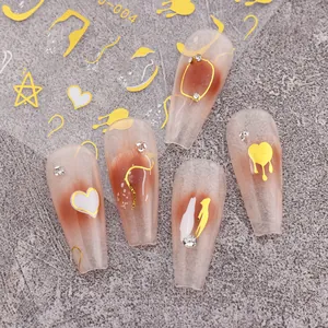 3D metallic gold heart and line nail art stickers on long matte manicured tips