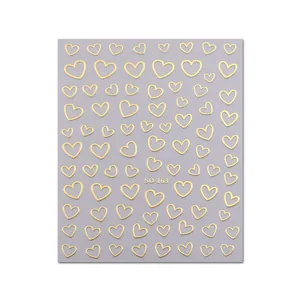 Detail showing SO-163 3D metallic gold heart nail art stickers with irregular lines