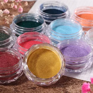 Vibrant 9-color metallic nail mirror powder set in clear faceted jars for gradient art