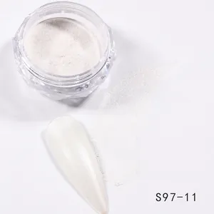 Macro shot of pearl nail powder S97-11 with pearlescent effect on transparent display