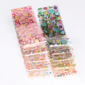 Détails de feuilles de transfert nail art aux motifs de fleurs et de dessins animés