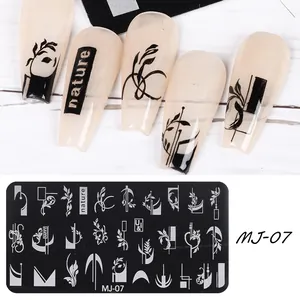 Detail of MJ-07 nail stamping plate showing botanical patterns and nature-inspired nail art