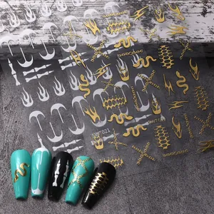 Pegatinas 3D para uñas en oro y blanco con diseños de llamas y cadenas para manicura art