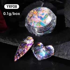 Macro shot of iridescent aurora nail powder glitter in clear container with heart display