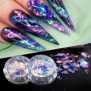 Macro detail of iridescent aurora nail flakes in jars with chameleon chrome effect on nails