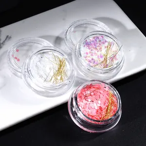 Tre vasetti di paillettes per unghie fiori di ciliegio con petali e filo dorato
