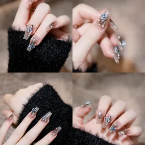 Long ballet press-on nails with black gradient, 3D roses and butterfly accents