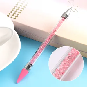 Dual-ended nail dotting tool with wax tip and acrylic rhinestone-filled handle