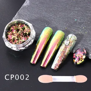Macro detail of iridescent aurora chameleon nail glitter flakes with applicator brush