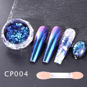 Macro shot of iridescent chrome nail powder CP004 with blue-purple chameleon finish