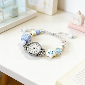 Detail of beaded bracelet watch featuring blue checkered cubes and adjustable drawcord