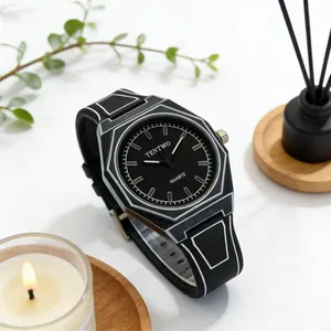 Artistic quartz watch with geometric white lines on black silicone strap and octagonal dial