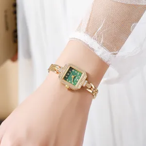 Elegant vintage square quartz watch with a green dial and gold diamond-encrusted bracelet