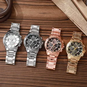 Detail shot of four luxury men's quartz watches with multi-dial display and metal bands