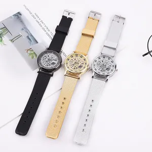 Fashion skeleton quartz watches with black silicone and metal mesh bands on white background
