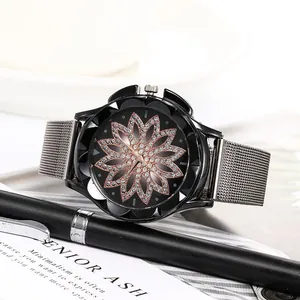 Women's quartz watch with petal bezel and diamond floral dial on silver mesh band