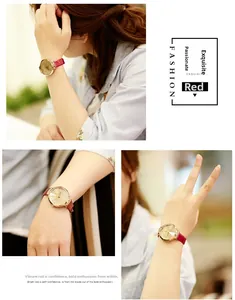 Détail d'une montre dorée élégante pour femme avec bracelet rouge et cadran étoilé brillant