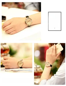 Détails d'une montre à quartz or rose avec cadran étoilé et bracelet en cuir noir