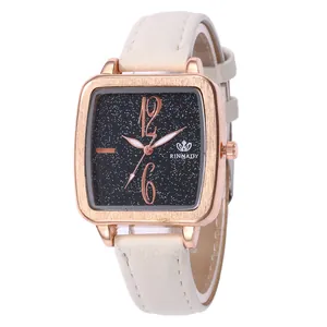 Women's square rose gold watch with starry sky dial and white faux leather strap