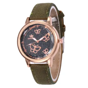 Montre à quartz pour femme avec cadran ciel étoilé et papillons dorés sur bracelet vert