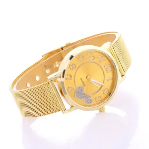 Women's gold mesh strap quartz watch featuring a frosted heart pattern on a gold dial