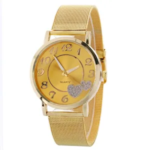 Gold mesh band quartz watch for women with dual sparkling heart motifs on a sunray dial