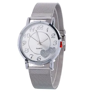Silver mesh band quartz watch for women featuring a minimalist heart design on dial
