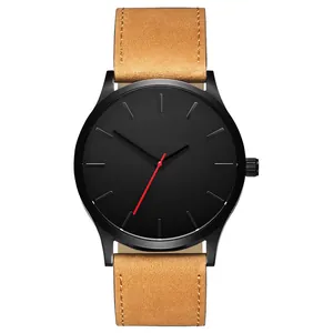 Minimalist big dial watch with black face, brown suede strap, and red second hand