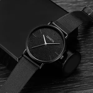 Sleek all-black men's minimalist quartz watch with stainless steel mesh band on dark background