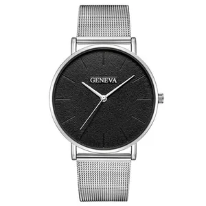 Macro detail of silver Milanese mesh watch strap and black textured dial with bar indices