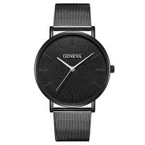 Detail of all-black quartz watch with Geneva logo, matte dial, and metal mesh strap