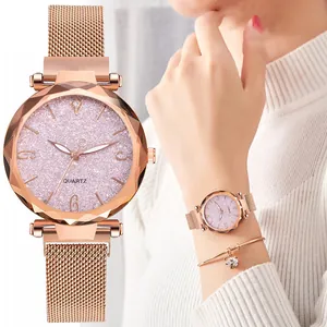 Reloj de mujer en oro rosa con esfera de purpurina rosa y correa milanesa de malla fina