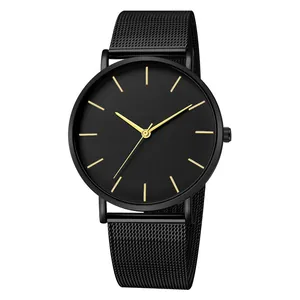 Minimalist men's watch with black Milanese mesh strap and golden minimalist hour markers
