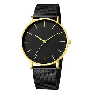 Minimalist quartz watch featuring a black dial, gold case, and black mesh steel band