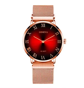 Detail of Milanese rose gold watch strap and red gradient dial with Roman numerals