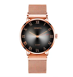 Detail of magnetic Milanese mesh strap and rose gold Roman numeral quartz watch dial