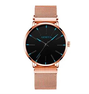 Montre à quartz Geneva avec bracelet en maille or rose et cadran noir aux index bleus