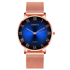 Detailed close-up of blue sunray dial and rose gold mesh strap on quartz watch