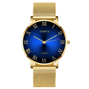 Detail of blue sunburst dial with Roman numerals and golden Milanese mesh strap watch