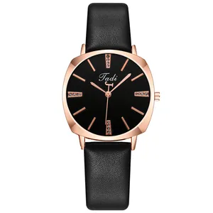 Women's minimalist quartz watch with black dial and rose gold case on leather strap