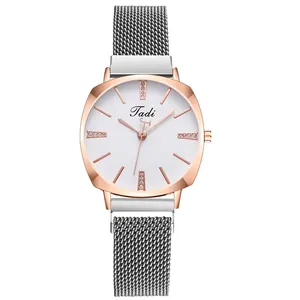 Elegant ladies quartz watch with rose gold case, silver mesh strap and rhinestone markers