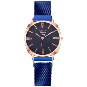Women's quartz watch with rose gold case, blue mesh strap and diamond markers