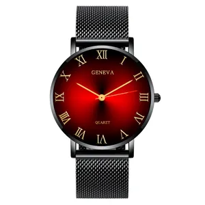 Detail of red sunburst dial with gold Roman numerals and black mesh strap on quartz watch