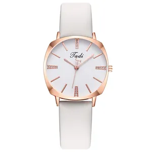 Minimalist white leather quartz watch for women with rose gold case and rhinestone markers