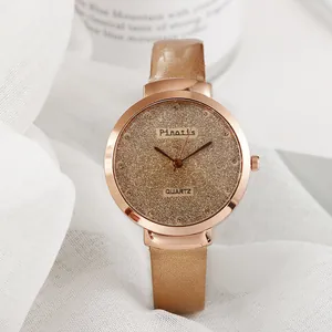 Montre femme quartz or rose avec cadran pailleté et bracelet fin en cuir scintillant