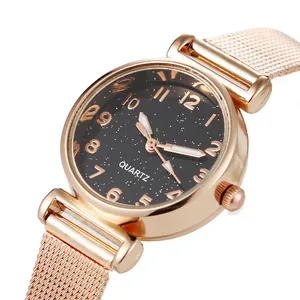 Orologio al quarzo da donna in oro rosa con quadrante stellato e cinturino in maglia