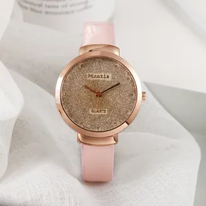 Montre à quartz pour femme avec bracelet en cuir PU rose, cadran scintillant et boîtier or rose